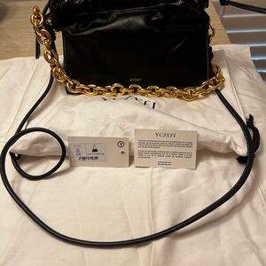 Yuzefi NWT Black bom bag.  Don’t miss out!